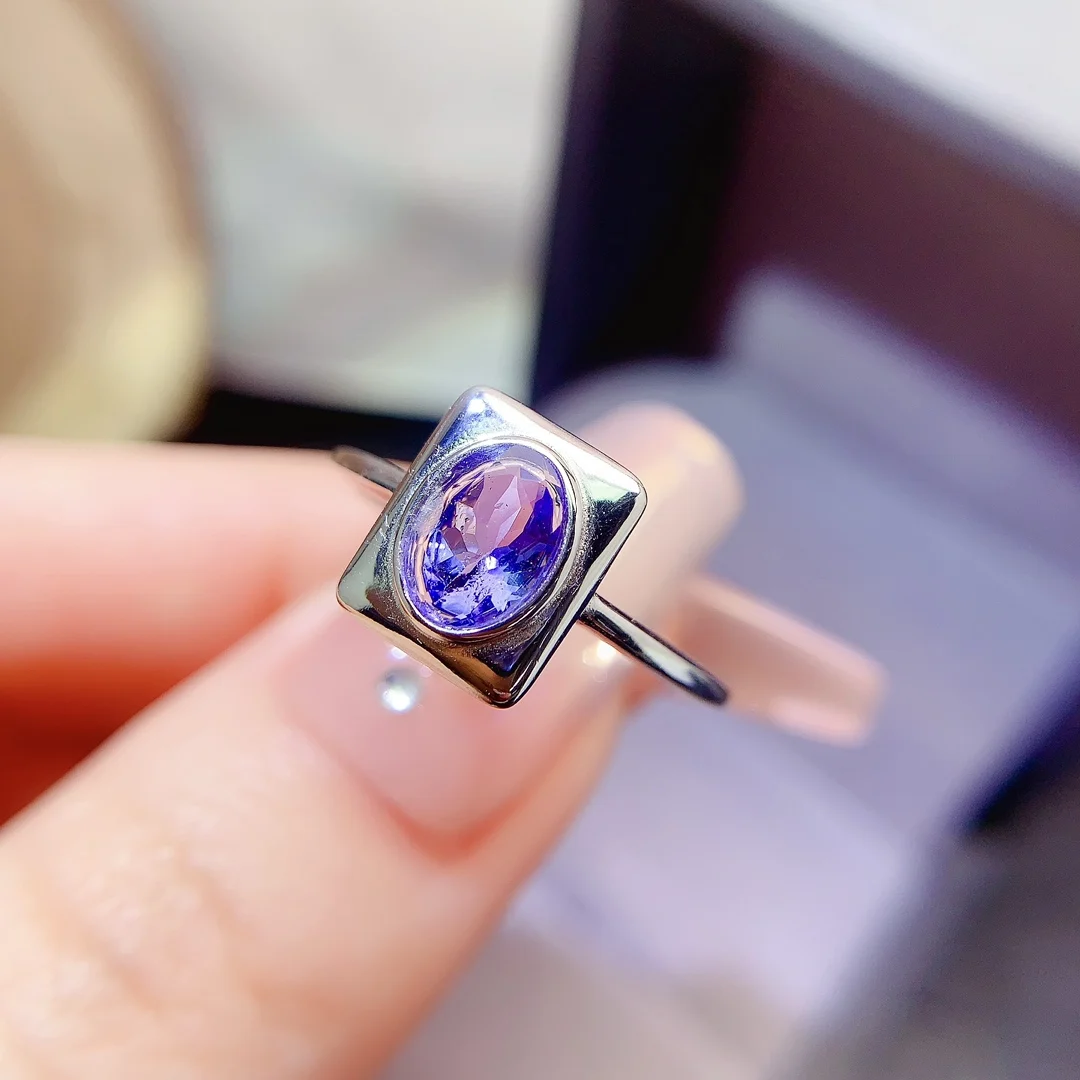 Natural Tanzanite Luxury Halo Ring - view 1